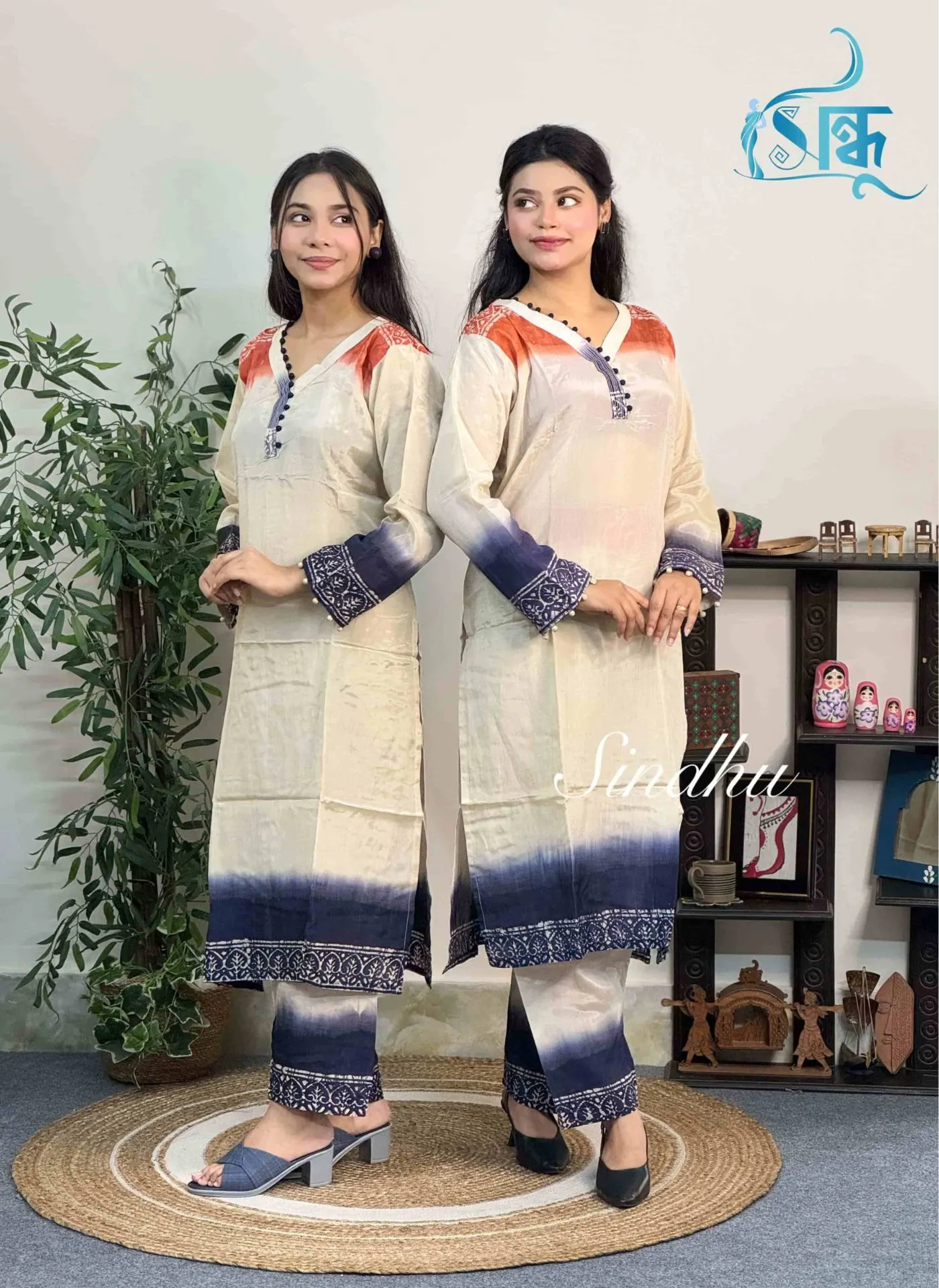 Women's off white and navy blue rayon silk two piece (kurti and pant) by Sindhu